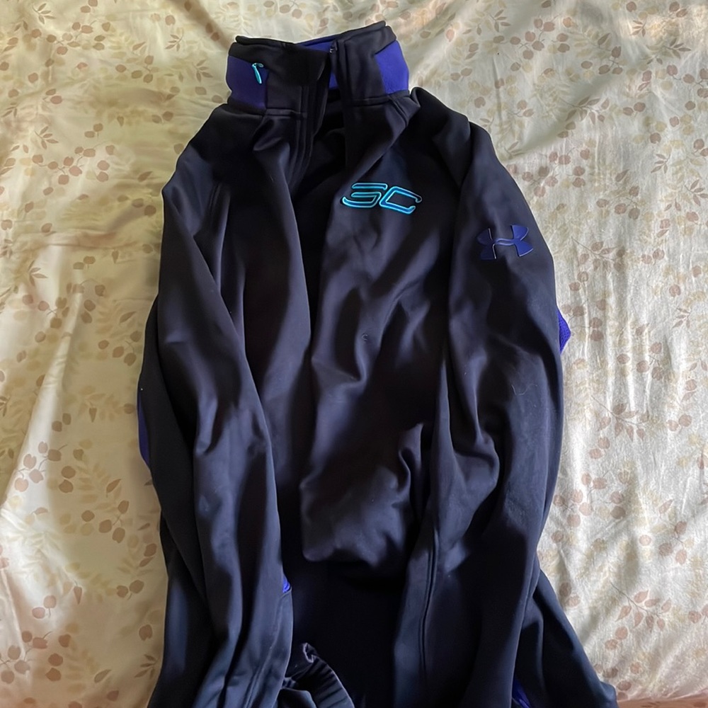 Men’s Under Armour Stephen Curry Zip up w/retractable hood. Size M.